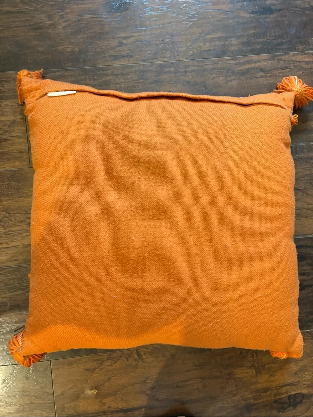 Handwoven Orange Tassel Throw Pillow